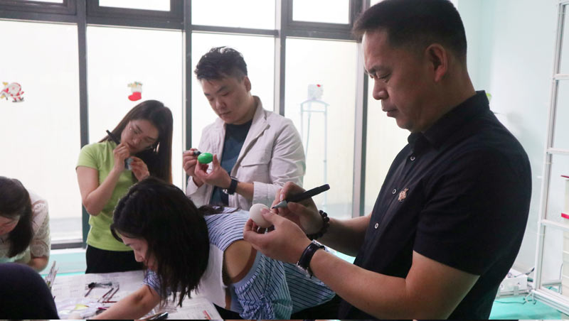 品粽香滋味,绘多彩生活 | 海洋之神HY590举办“包粽子 · 绘彩蛋 · 迎端午”主题活动